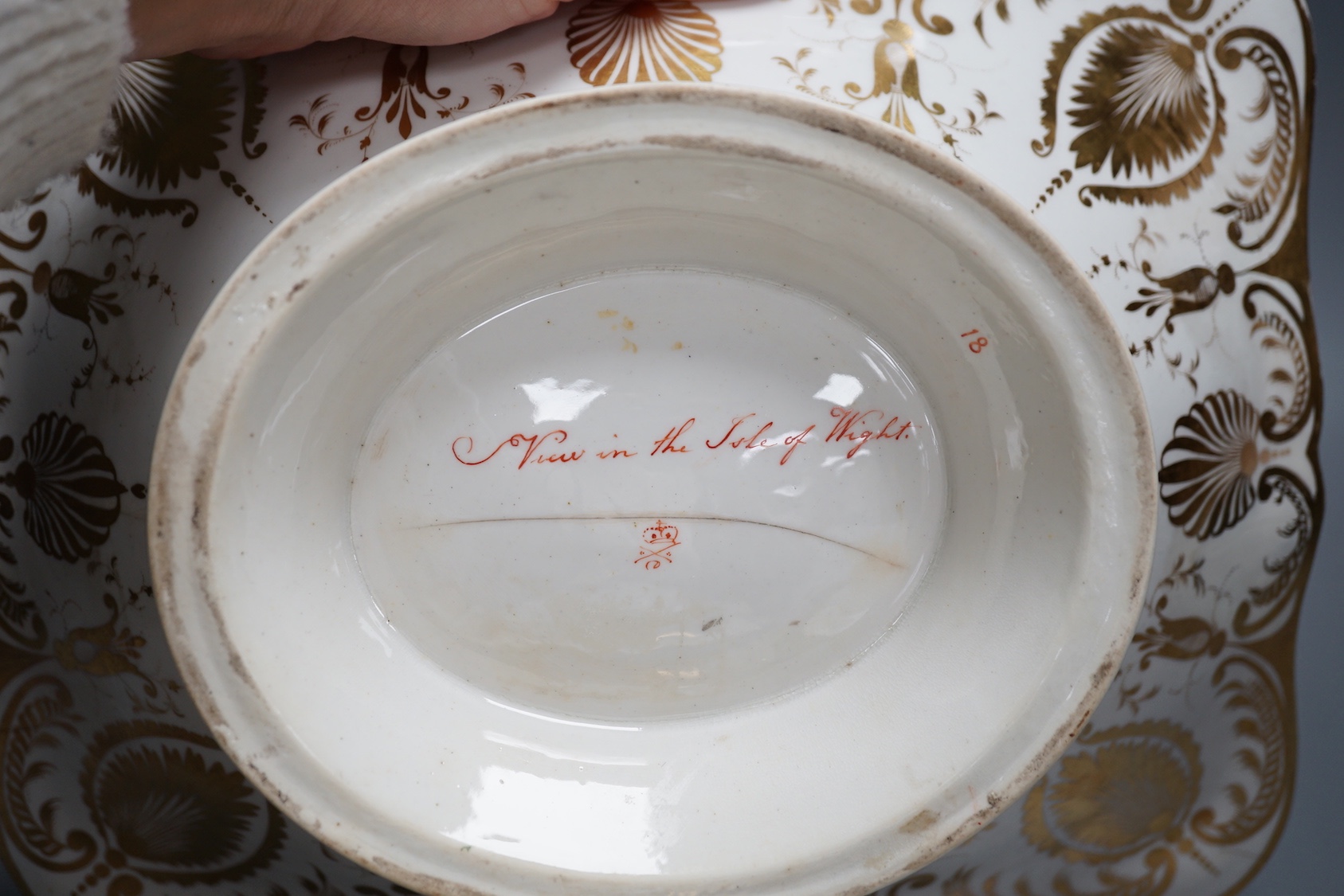 A Derby twin handled dish painted with a 'View in the Isle of Wight' and teapot and cover with two scenes, 'View in Scotland' and 'Near Belmar, Derbyshire c.1815